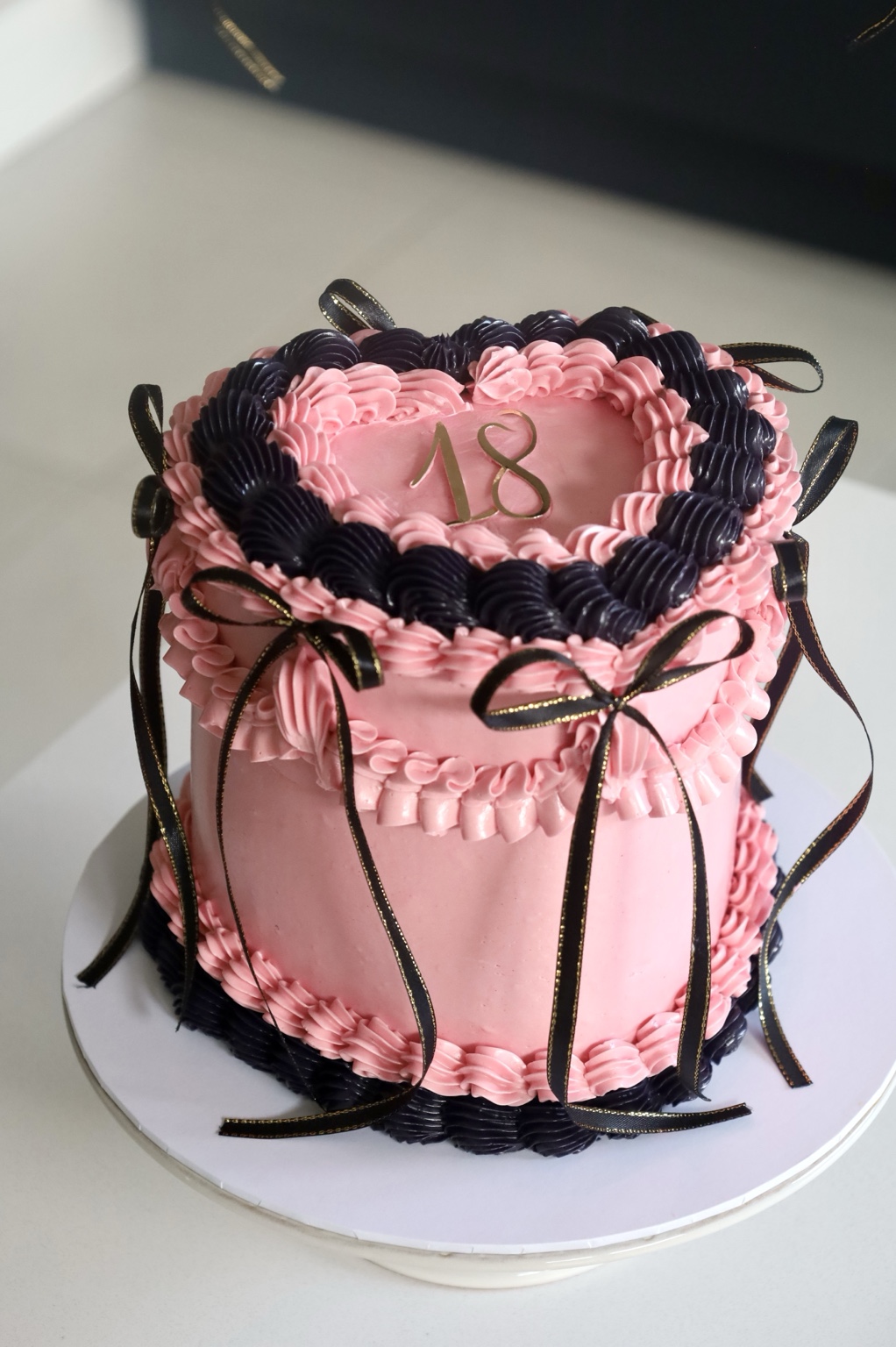 Pink and black ribbon 18th birthday cake